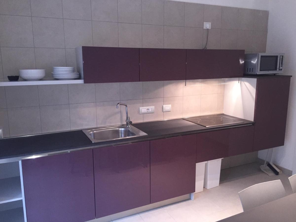 Komodo Short Stay Apartments Trento Esterno foto